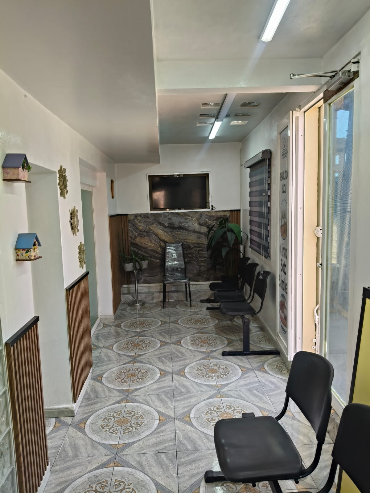 Imagen de sala de espera de Clínica dental New Smile